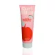 Curl Bites Refreshing Weightless Shampoo sampon rózsaszín tubusban, piros alma mintával és zöld kupakkal.